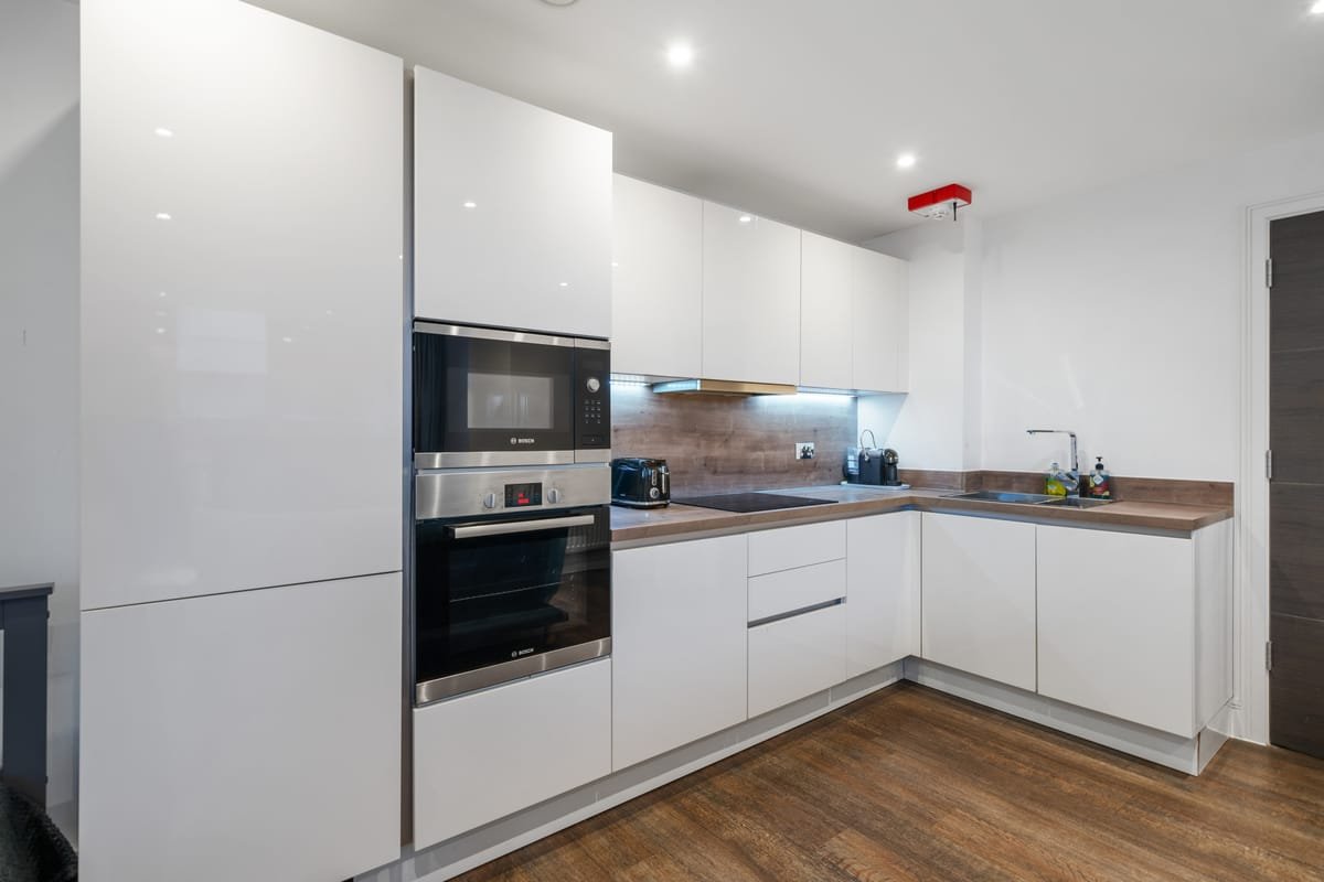 Riverside 1BR — living room & kitchen